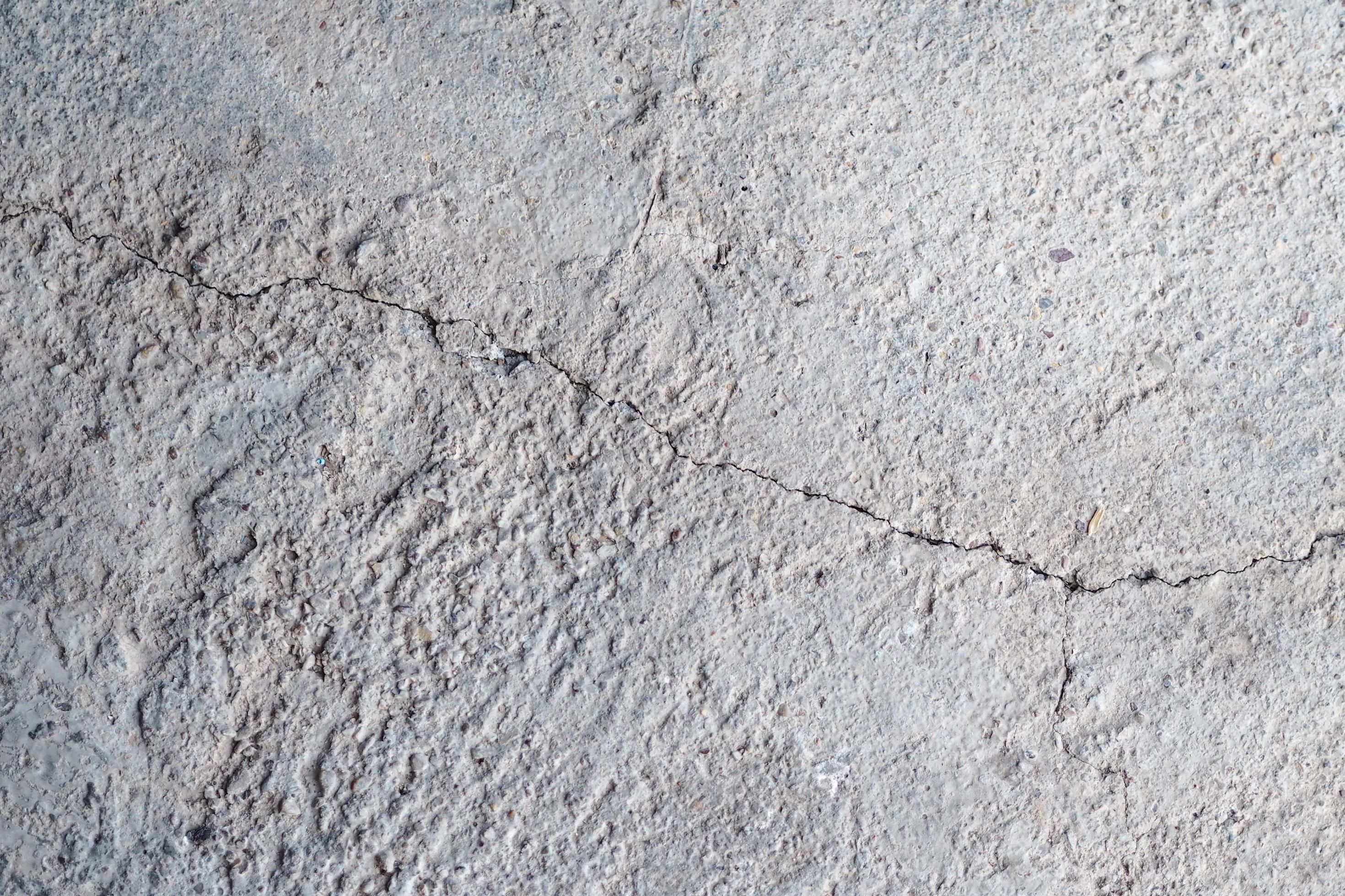 Cracks in concrete wall because it has an expiration date. Cracked