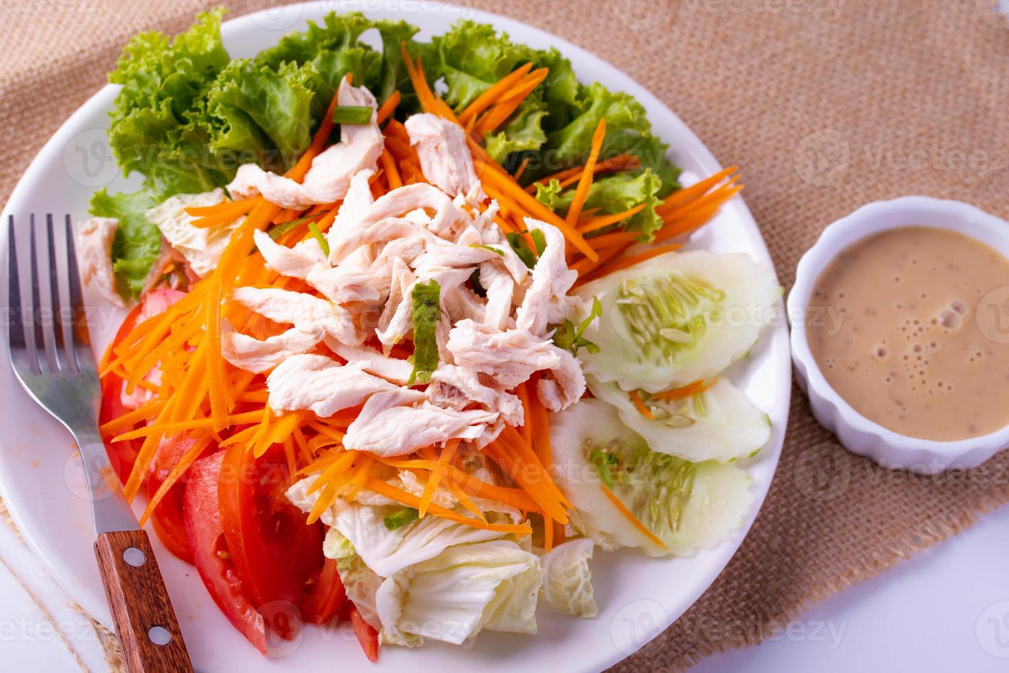 Vegetable Salad with Chicken Out and Sesame Dressing. Clean Food photo