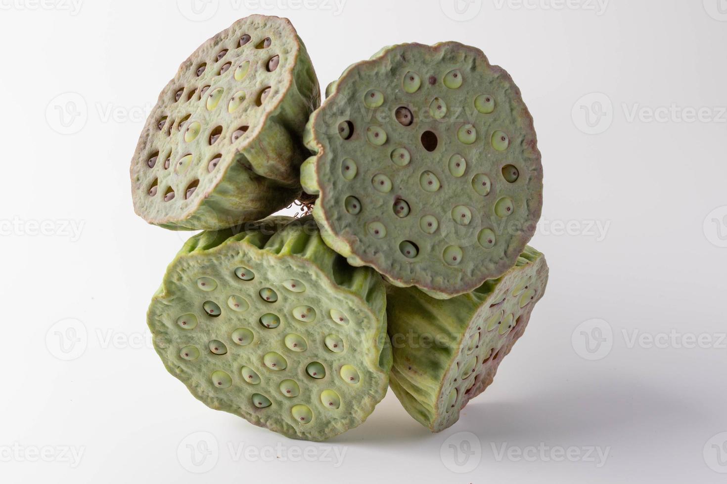 4 green Lotus seeds on a white background photo