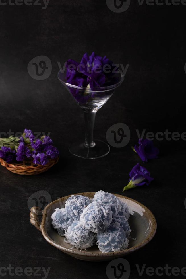 Sugar Dumplings with Coconut, Butterfly Pea flower, Healthy Thai dessert.Organic Thai food.Kanom Ko. photo