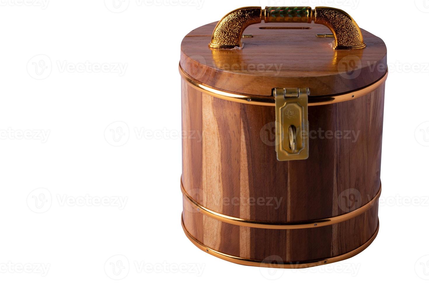 Wooden savings bank with a key lock on the front photo