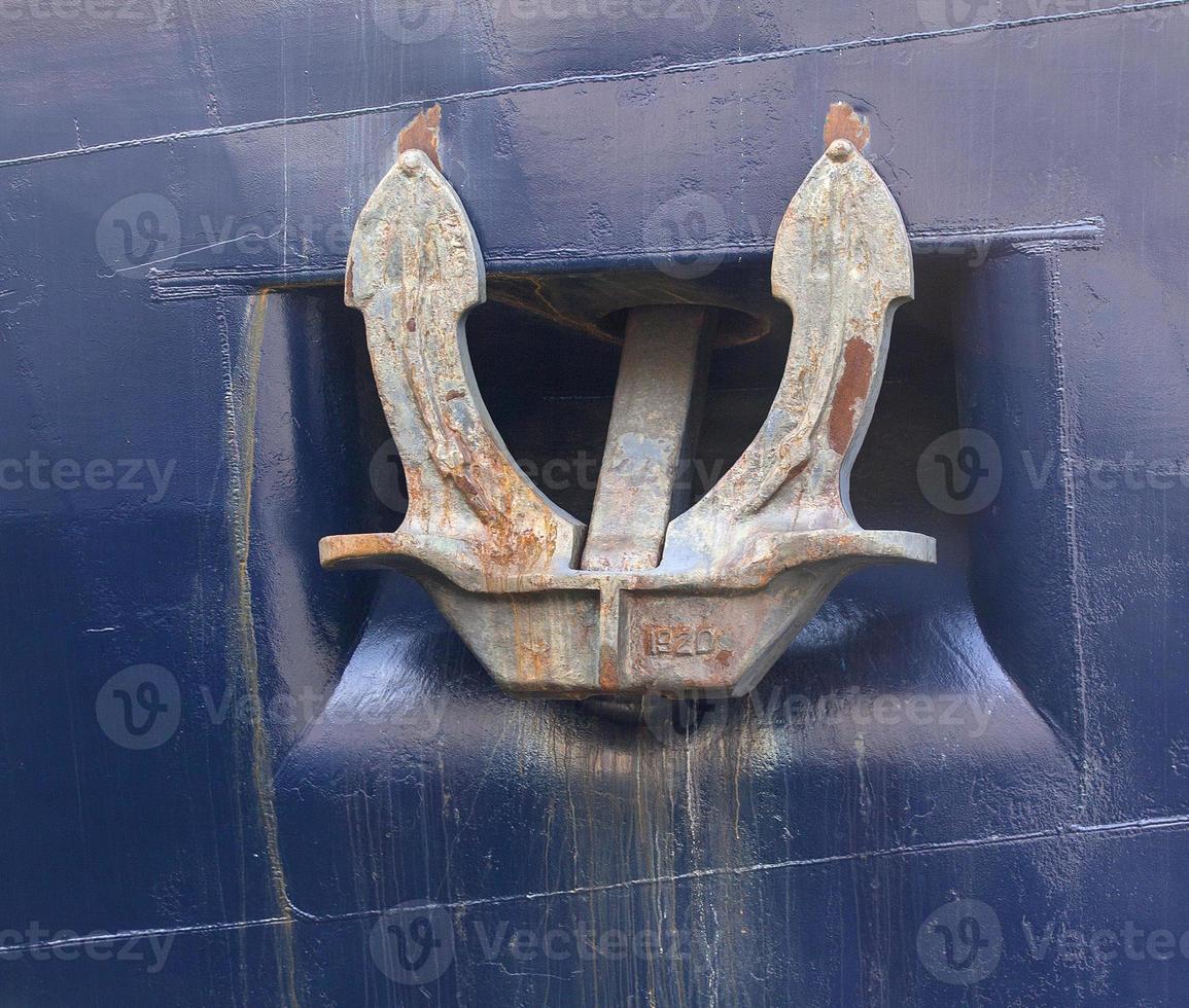 anchor of a sea vessel of blue color photo
