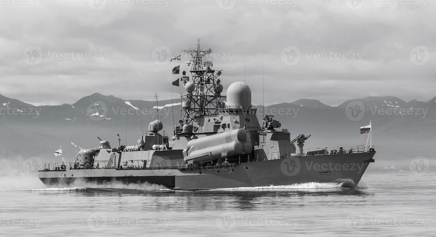 Russian warship going along the coast of Kamchatka Peninsula photo