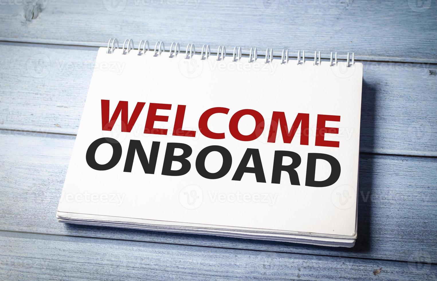 Welcome onboard and support symbol. Concept words Welcome onboard on white note photo
