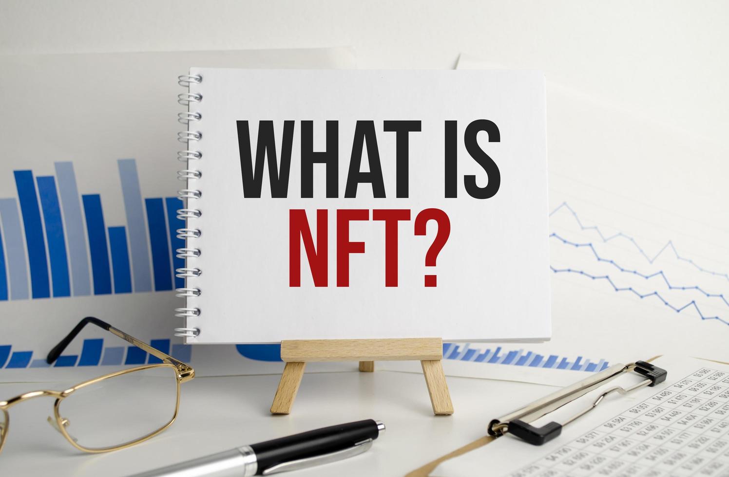 what is nft on notepad with office tools photo