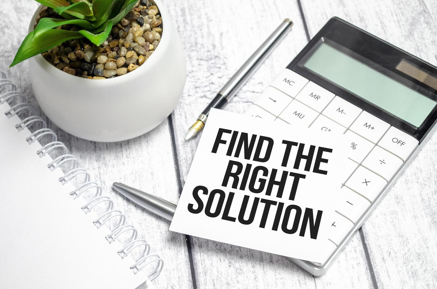 Text Find The Right Solution Written words on paper notebook . workplace. Business concept. photo