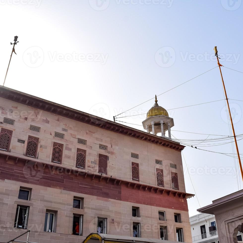 Gurudwara Sis Ganj Sahib is one of the nine historical Gurdwaras in Old Delhi in India, Sheesh Ganj Gurudwara in Chandni Chowk, opposite Red Fort in Old Delhi India photo