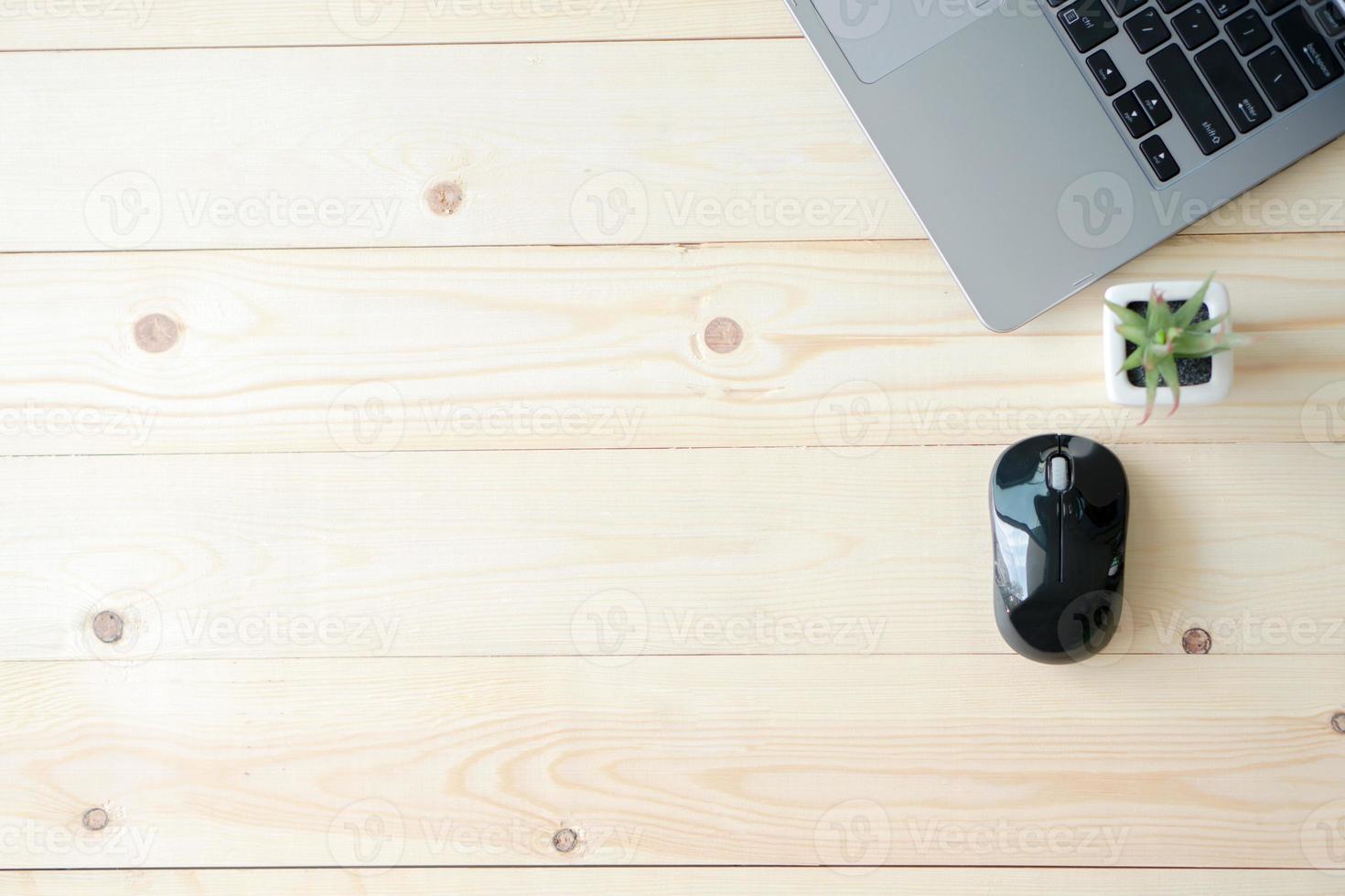 Neat workstation on a wooden desk photo