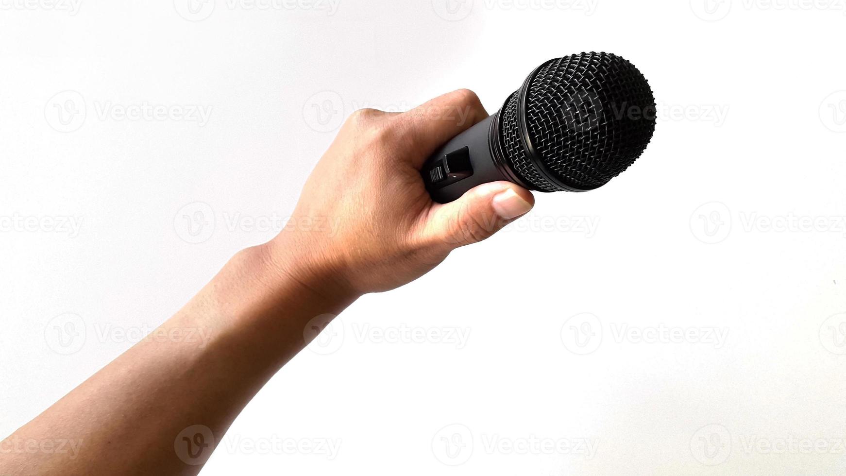 Microphone on hand isolated photo