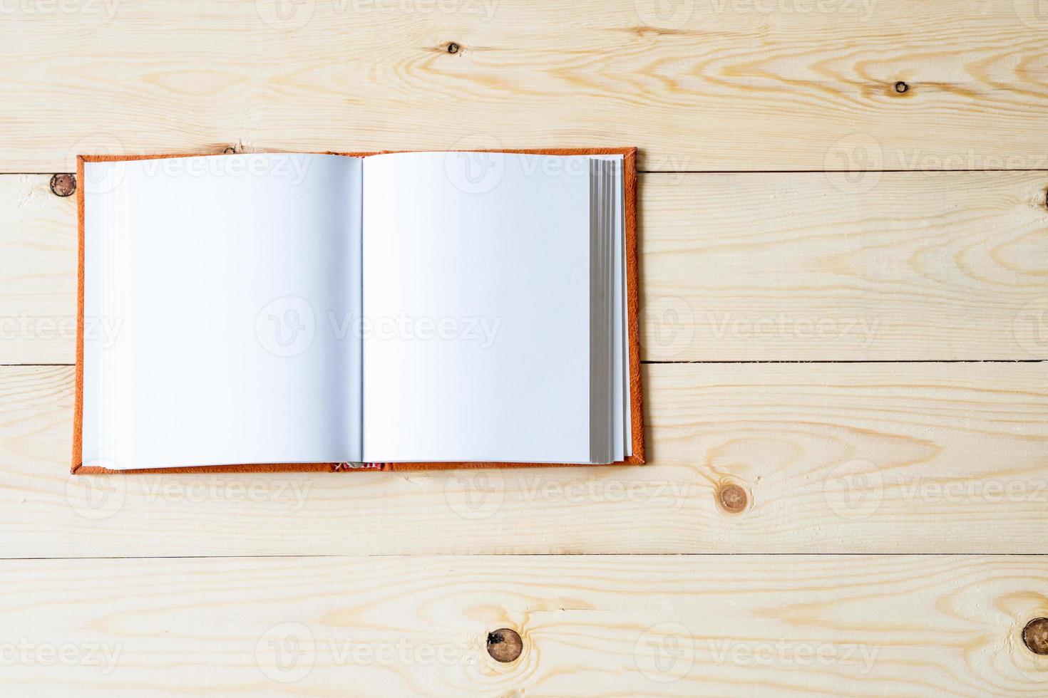 Binder notebook on wooden table photo