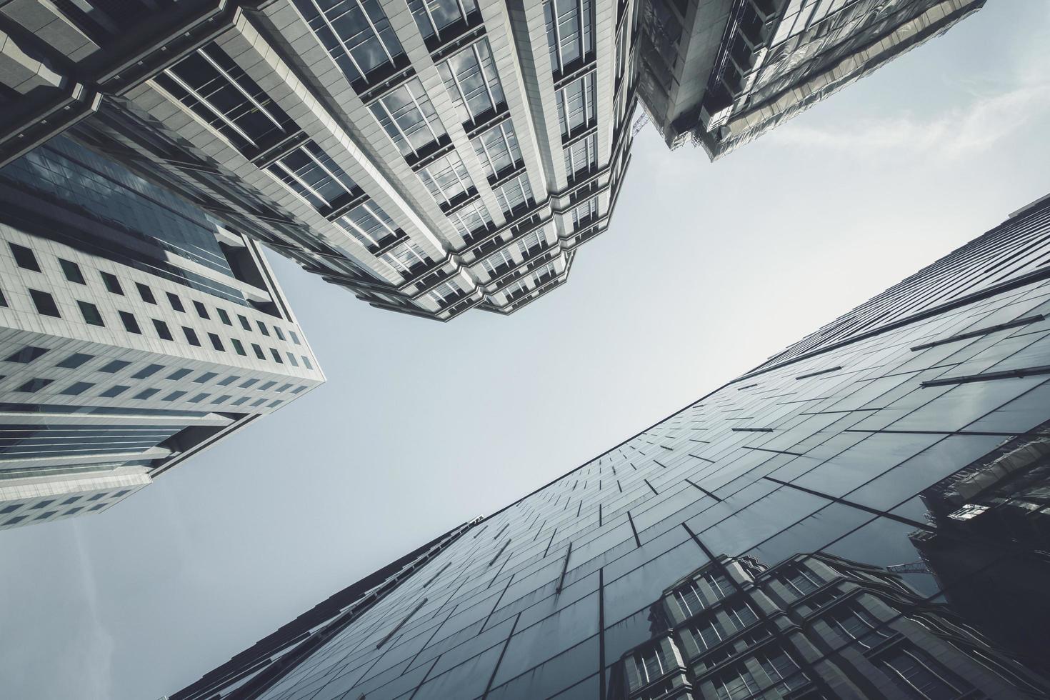 View of modern business skyscrapers glass and sky view landscape of commercial building in central city photo