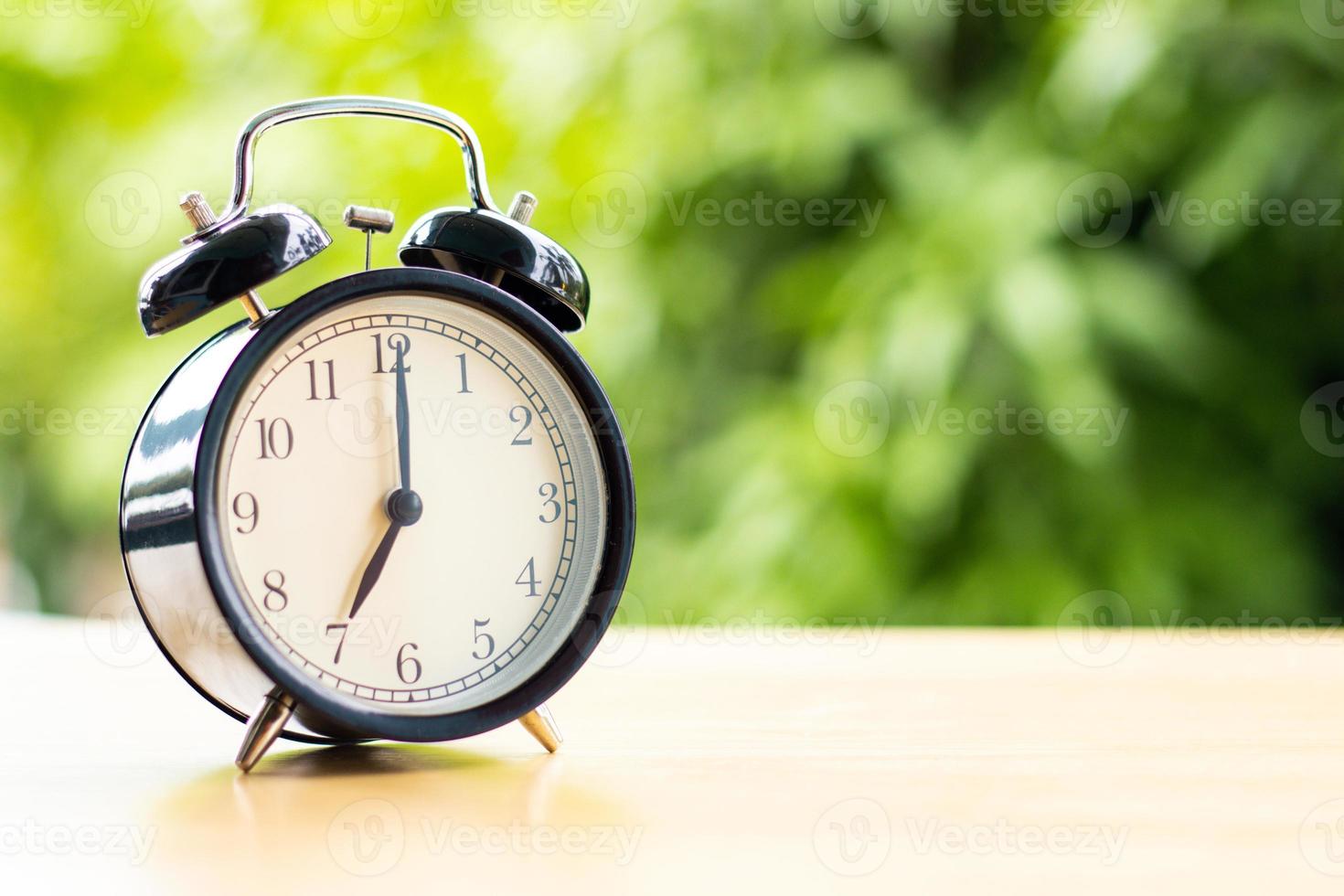 at 7 o'clock in the morning connect the time at for work with tree background copy space photo