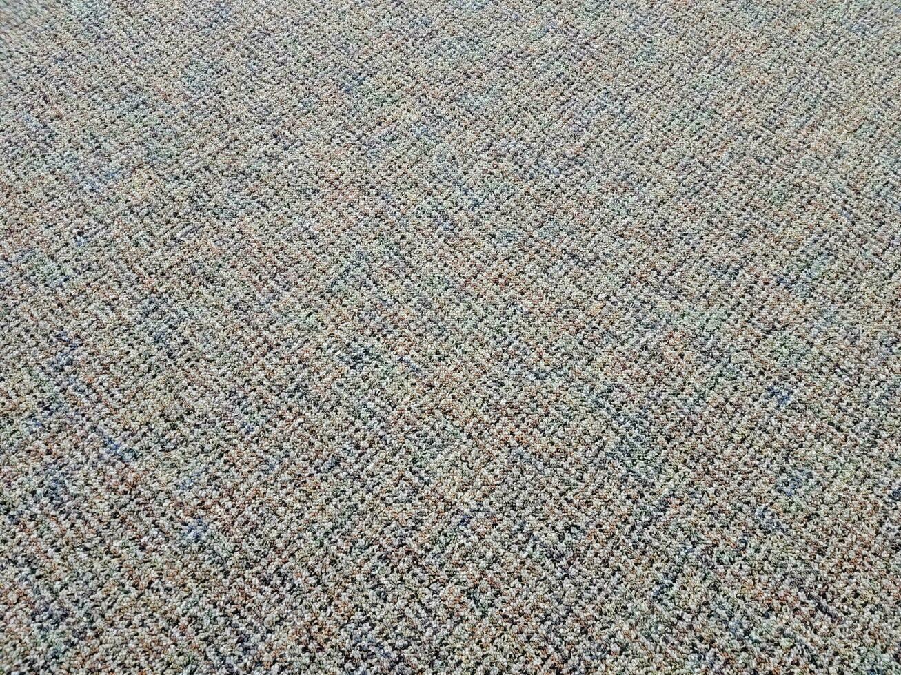 grey and brown carpet or rug on floor or ground photo