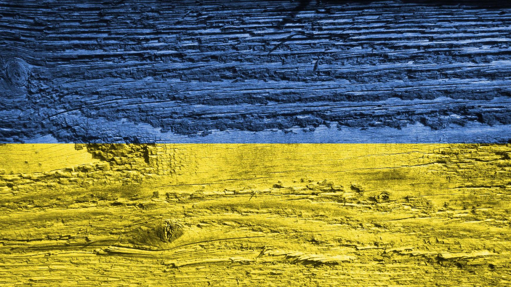 Ukraine flag. Ukraine flag on a wooden board photo
