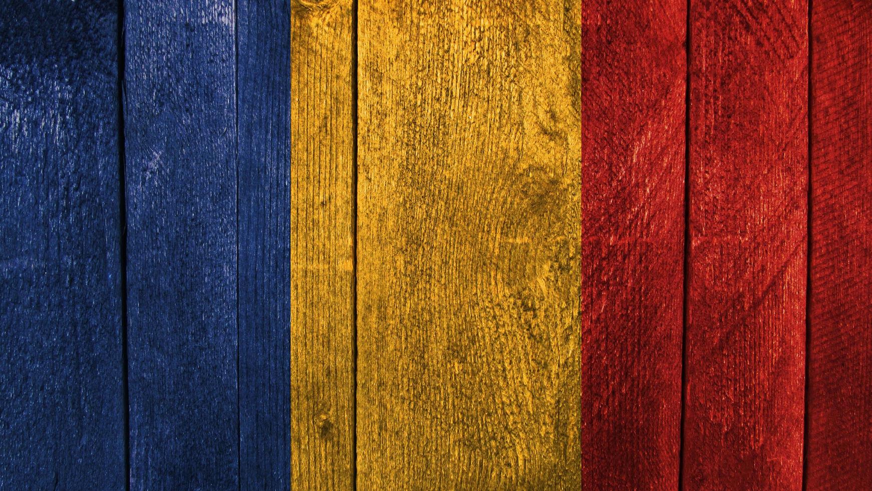 Moldova flag. Moldova flag on a wooden background photo