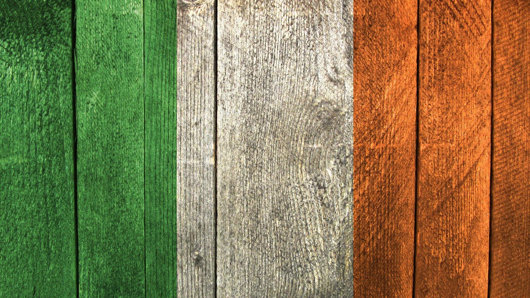 Ireland flag. Ireland flag on a wooden background photo