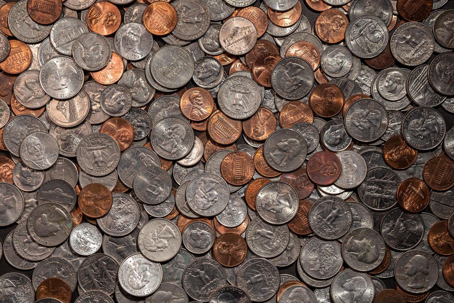 Pile of coins flat lay photo