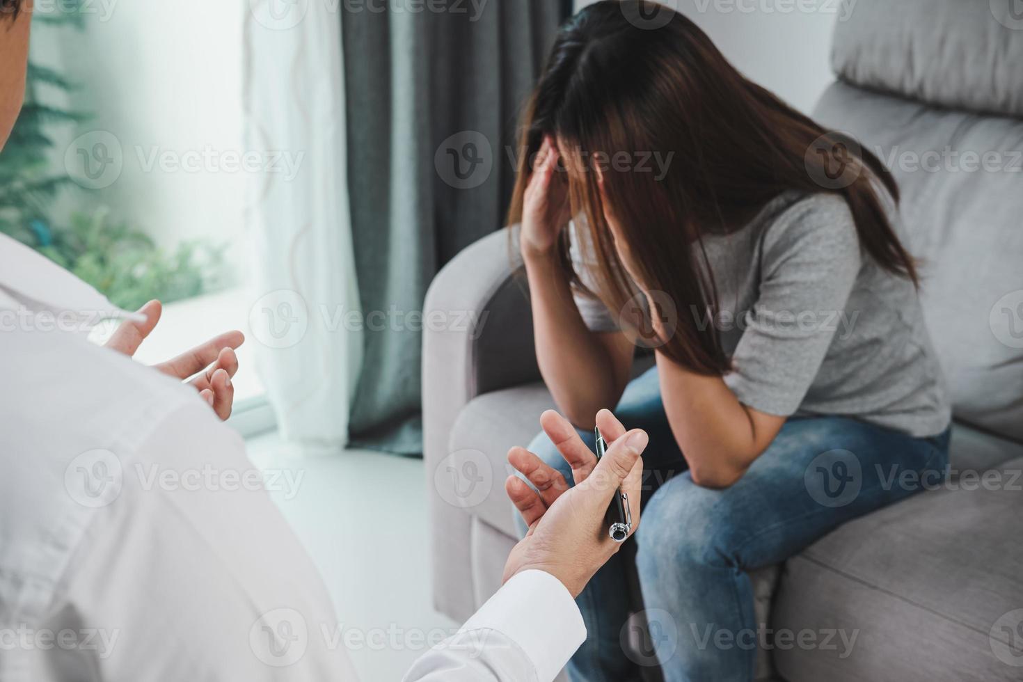 Professional psychologist doctor consulting his depressed patient photo