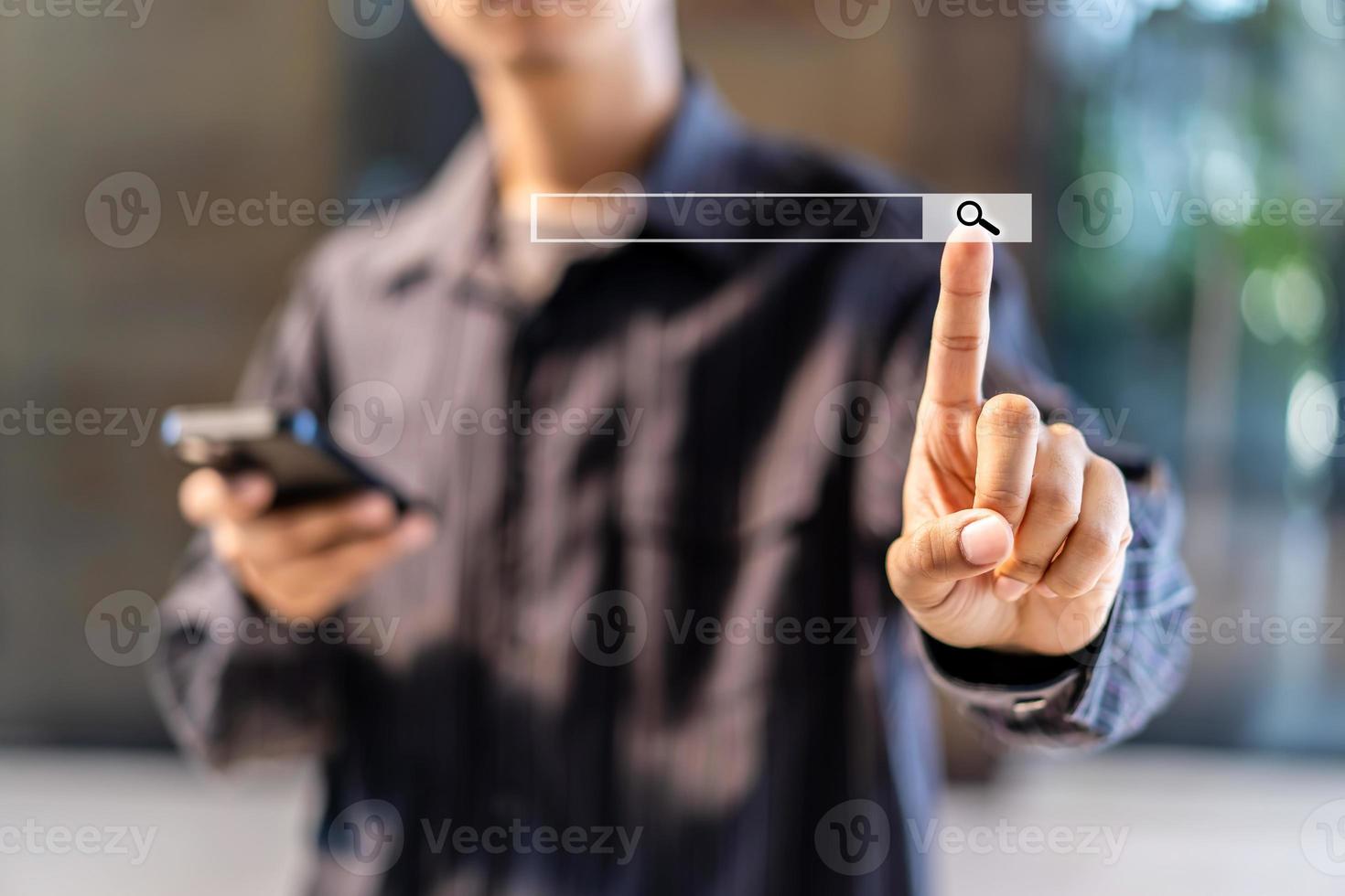 Data Search Technology Search Engine Optimization The human hand is using a mobile phone to find information using Search Console with your website. photo