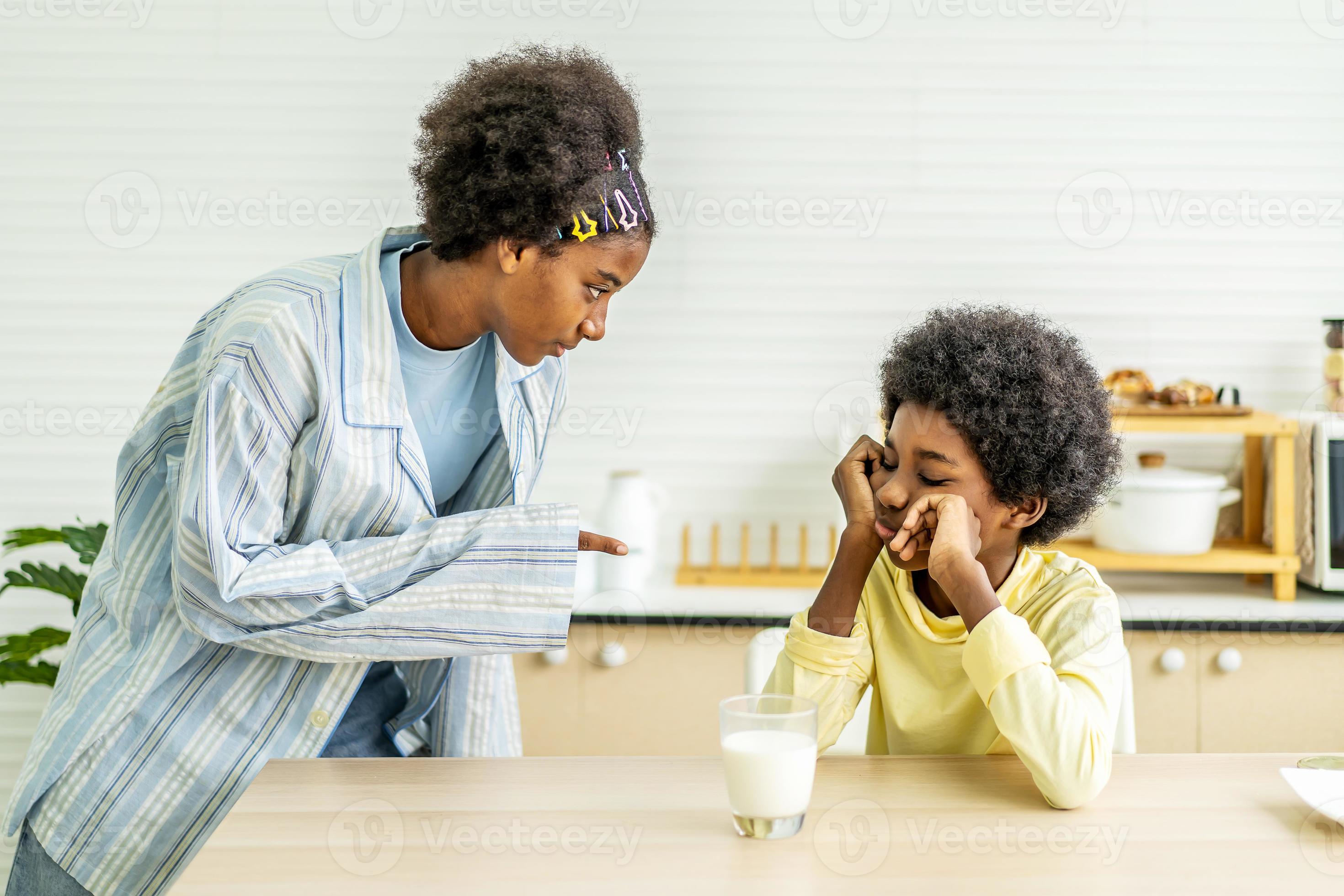 brother is bored don't want to drink milk until my sister forced me to  drink, Dairy Intolerant child refuses to drink milk 8063568 Stock Photo at  Vecteezy