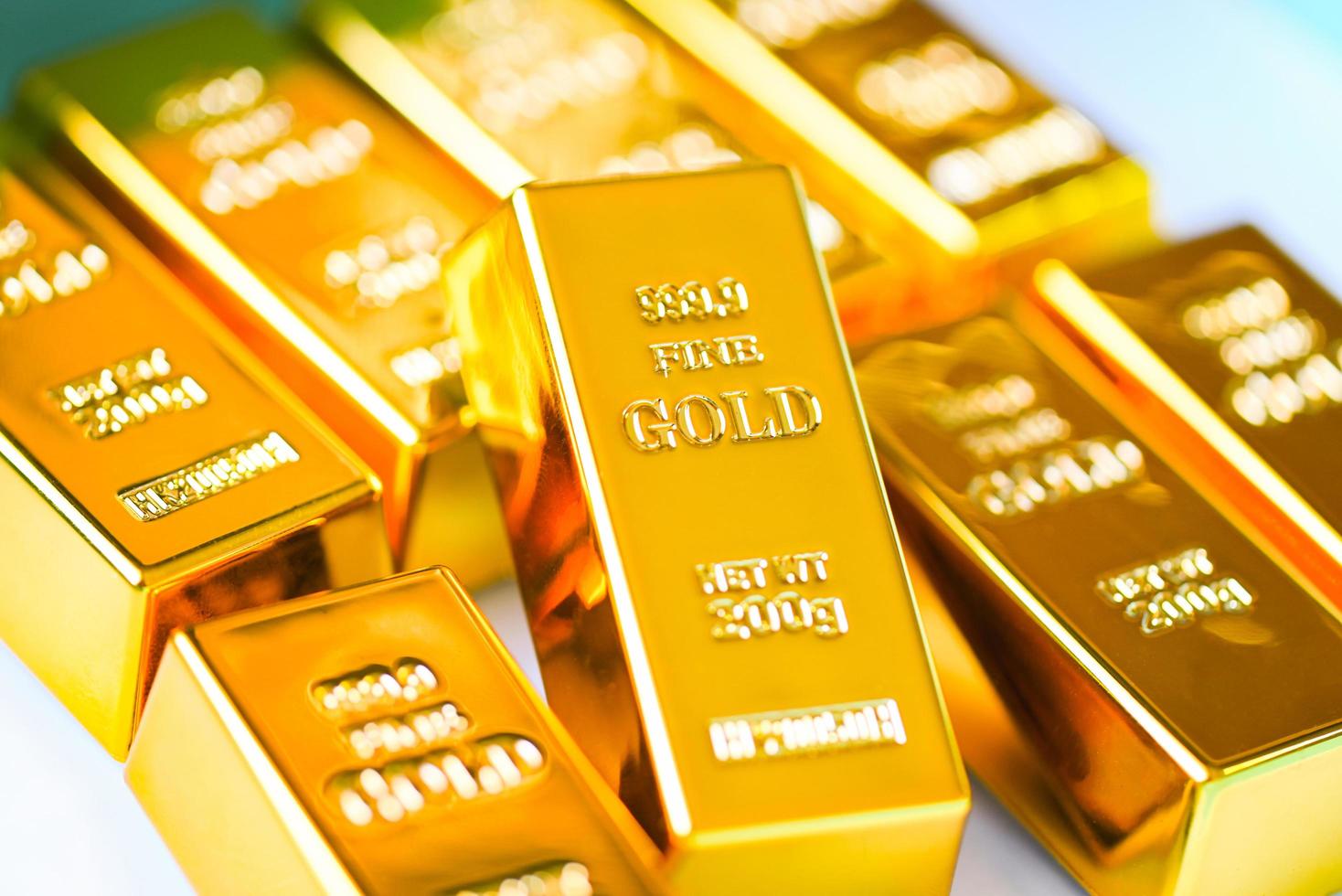 Gold bars on white background, gold bars financial business economy concepts, wealth and reserve success in business and finance photo