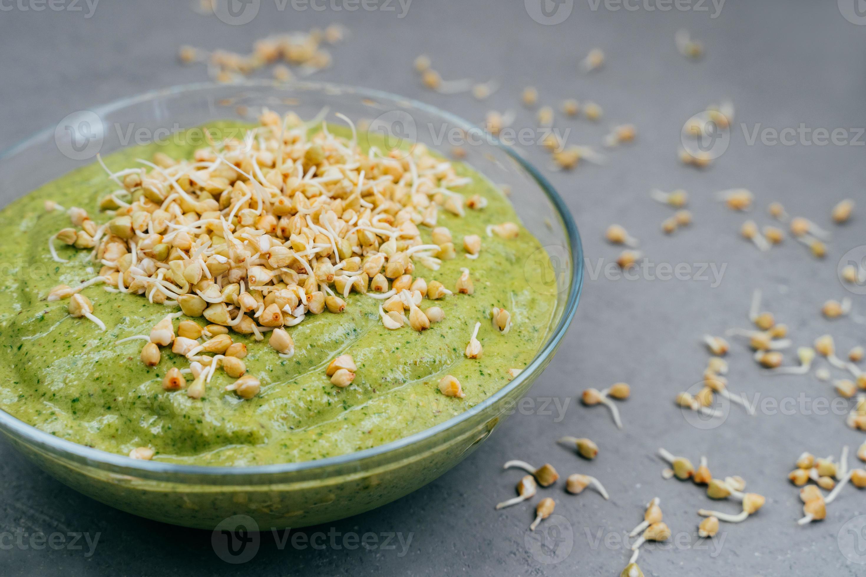 https://static.vecteezy.com/system/resources/previews/008/068/436/large_2x/refreshing-green-smoothie-in-glass-bowl-with-green-buckwheat-sprouts-on-grey-background-raw-dish-close-up-shot-helthy-vegetable-dish-photo.JPG