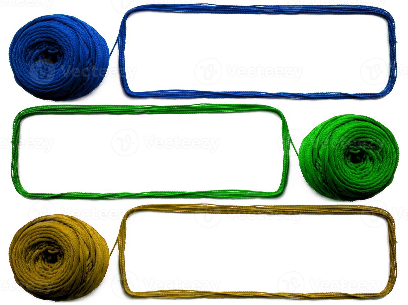 Colorful threads isolated on white background photo