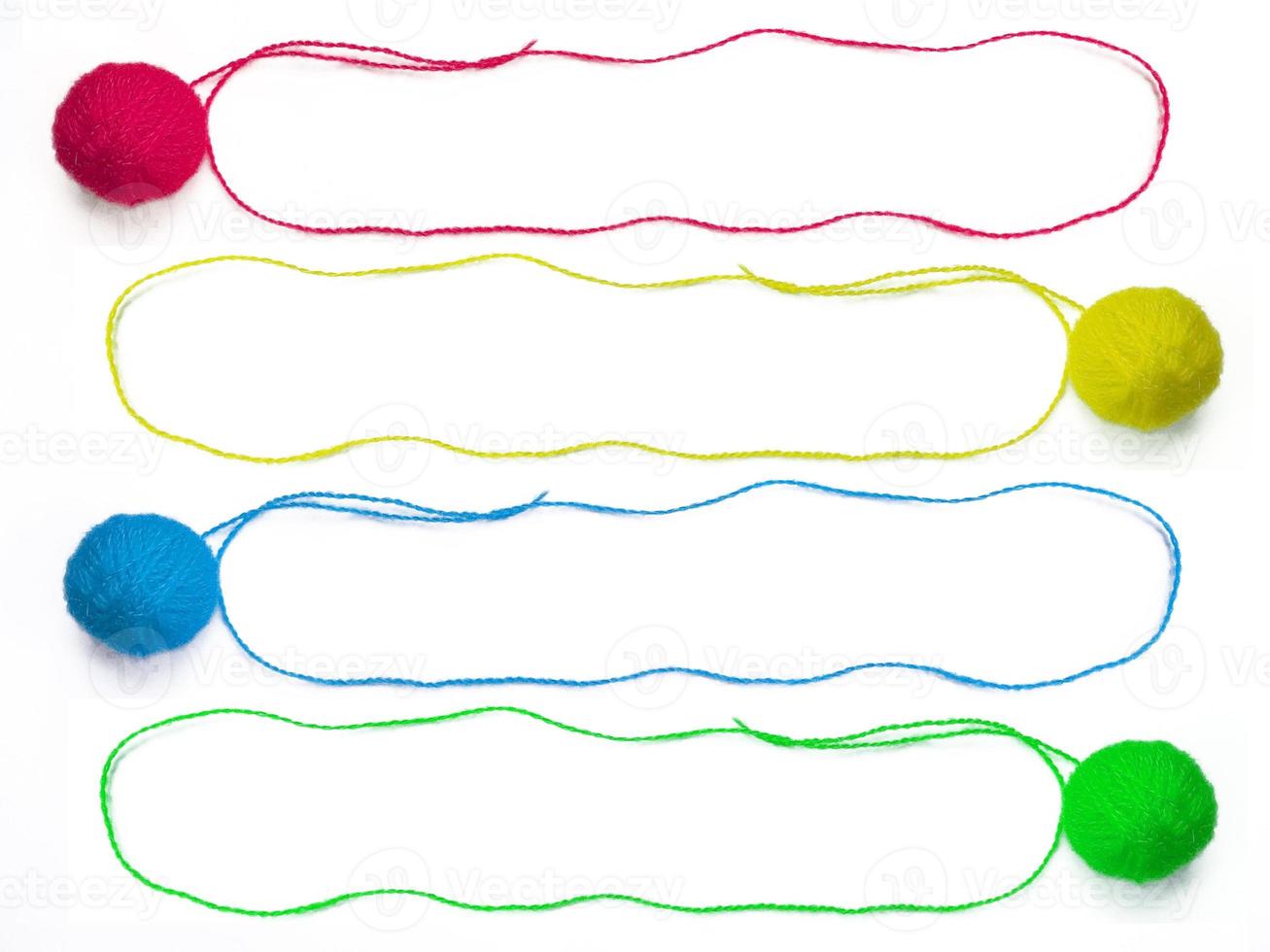 Colorful threads isolated on white background photo