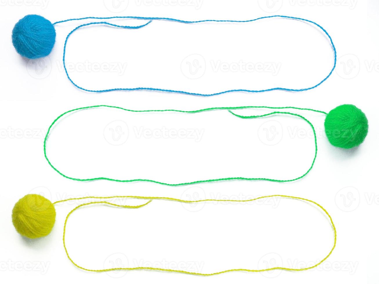 Colorful threads isolated on white background photo