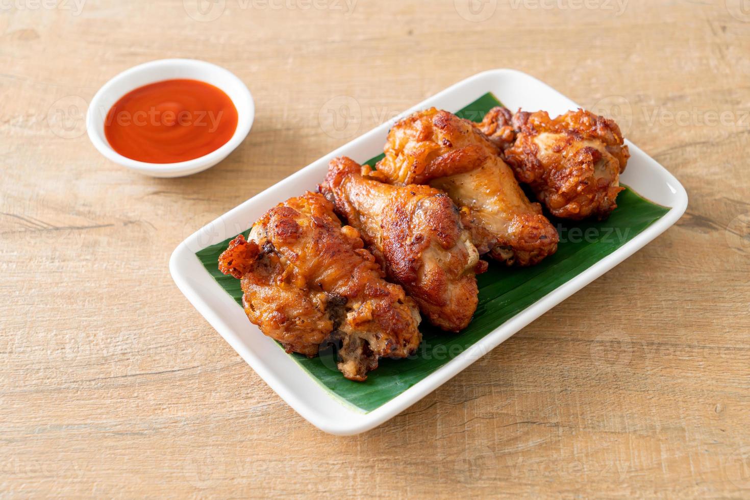 Crispy Fried Chicken with Fish Sauce 8074510 Stock Photo at Vecteezy