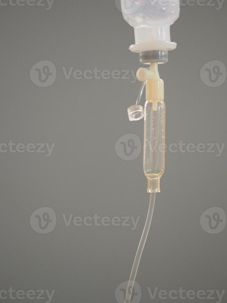 Set IV saline saline solution Fluid filled in pediatric patient hand in the hospital photo