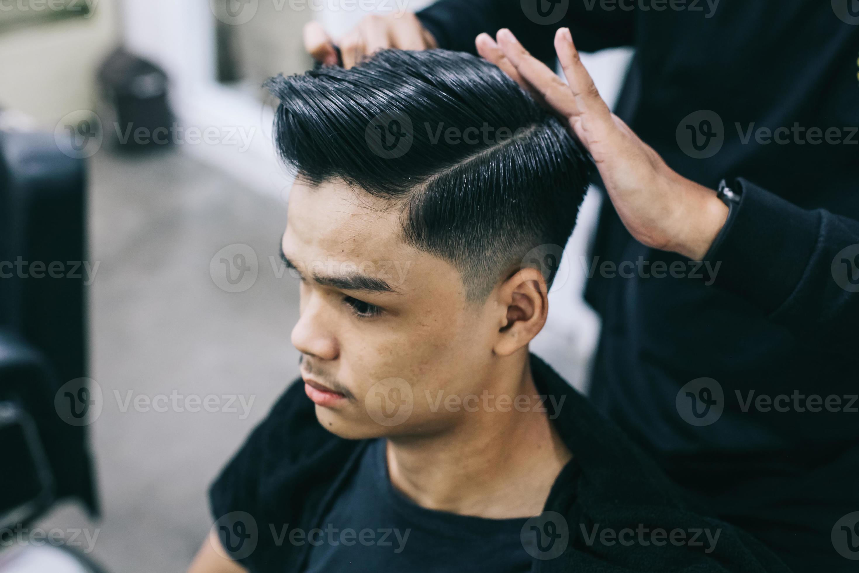 Young man at barbershop. Shave hair with the help of a hairdresser. Self-care, masculine beauty. Barber. Modern hair style 8075474 Stock Photo at Vecteezy Young man at barbershop. Shave hair with the help of a hairdresser. Self-care, masculine beauty. Barber. Modern hair style 8075474 Stock Photo at Vecteezy