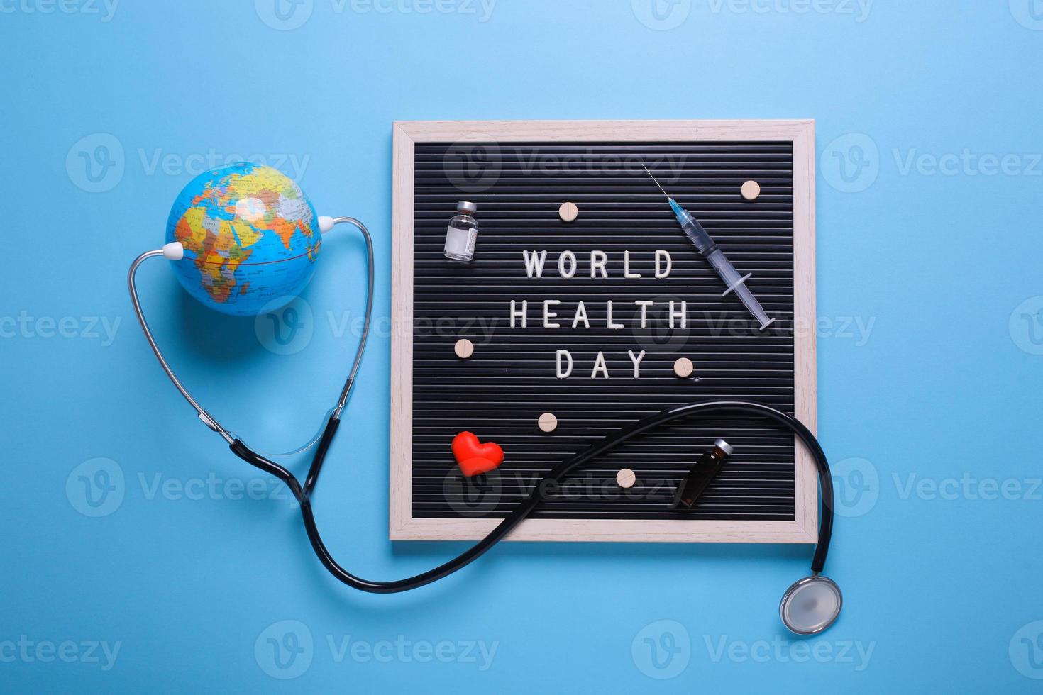 Creative flat lay composition of world health day on pastel blue background photo