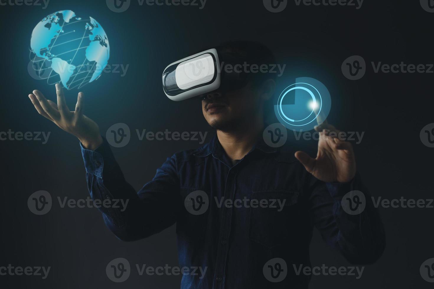 Future innovation concept, technological invention, youth using VR HeadSet opening modern experience, having fun, with floating globe full of virtual world, learning artificial intelligence or AI photo
