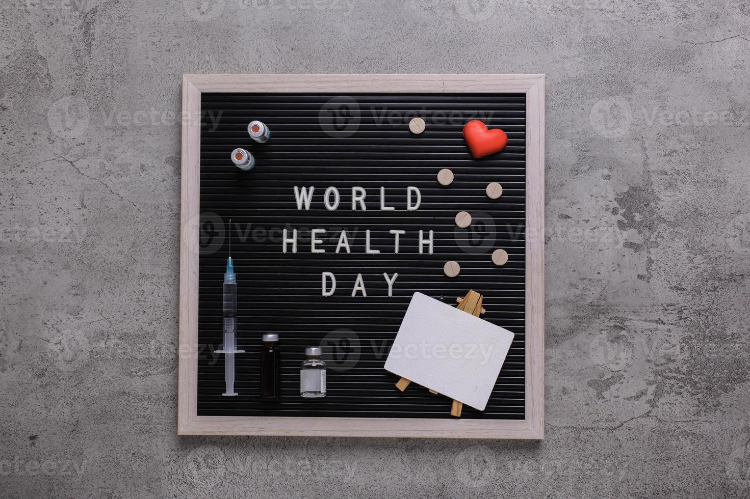 Framed World health day flat lay composition on cement texture background photo