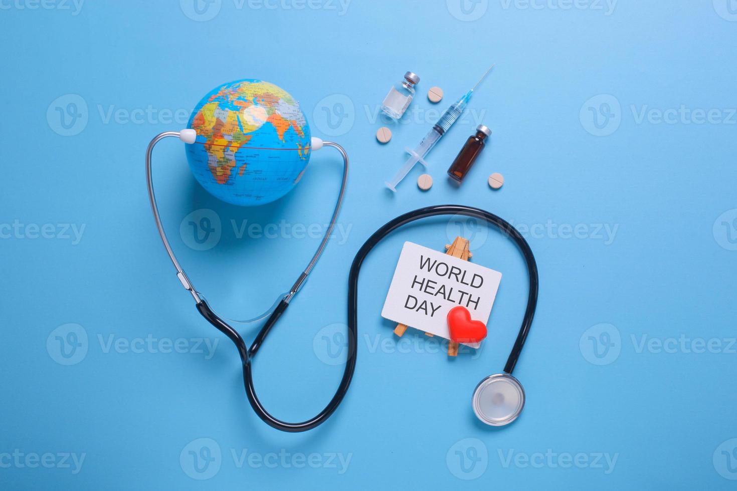 Creative flat lay composition of world health day on pastel blue background photo