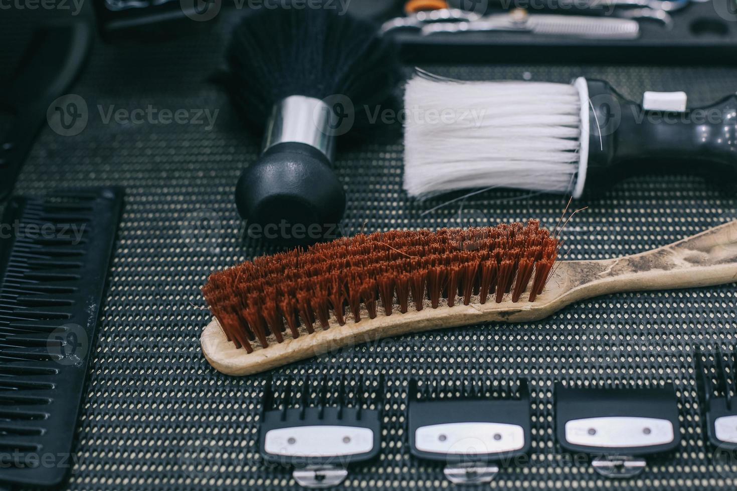 Various hair styling tools on the barbershop table photo