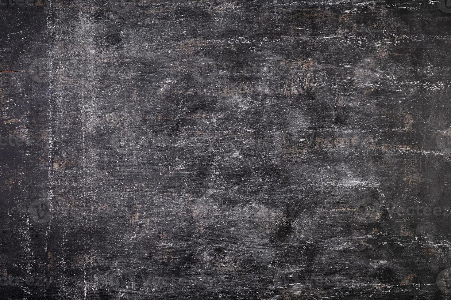 Background of dirty chalkboard. Empty school blackboard. photo