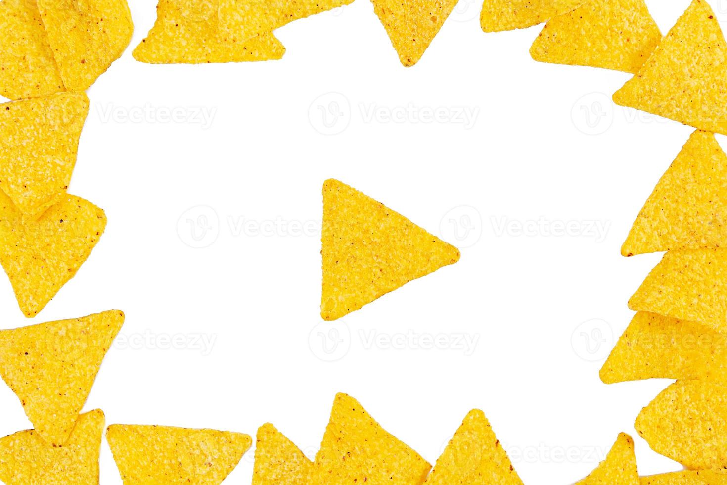 Nachos with cheese. Corn chips isolated on white background photo