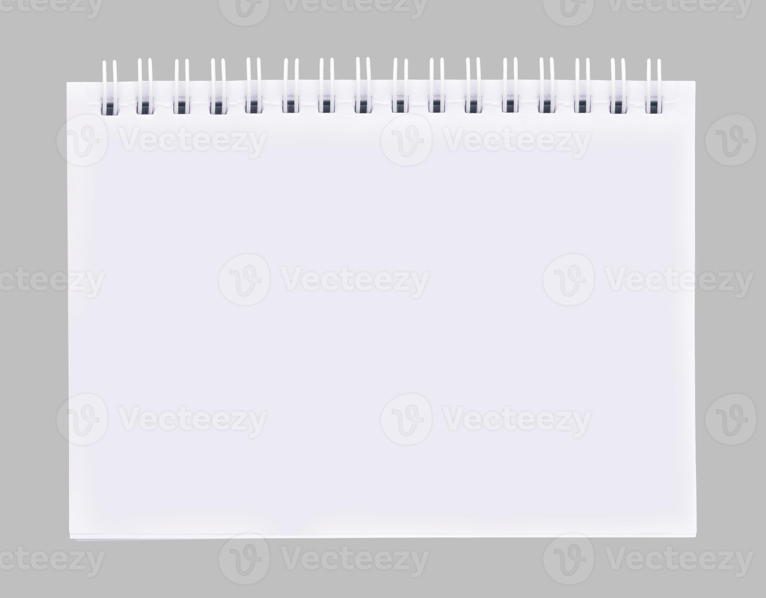 A white notebook is placed on a gray background. 8081975 Stock Photo at