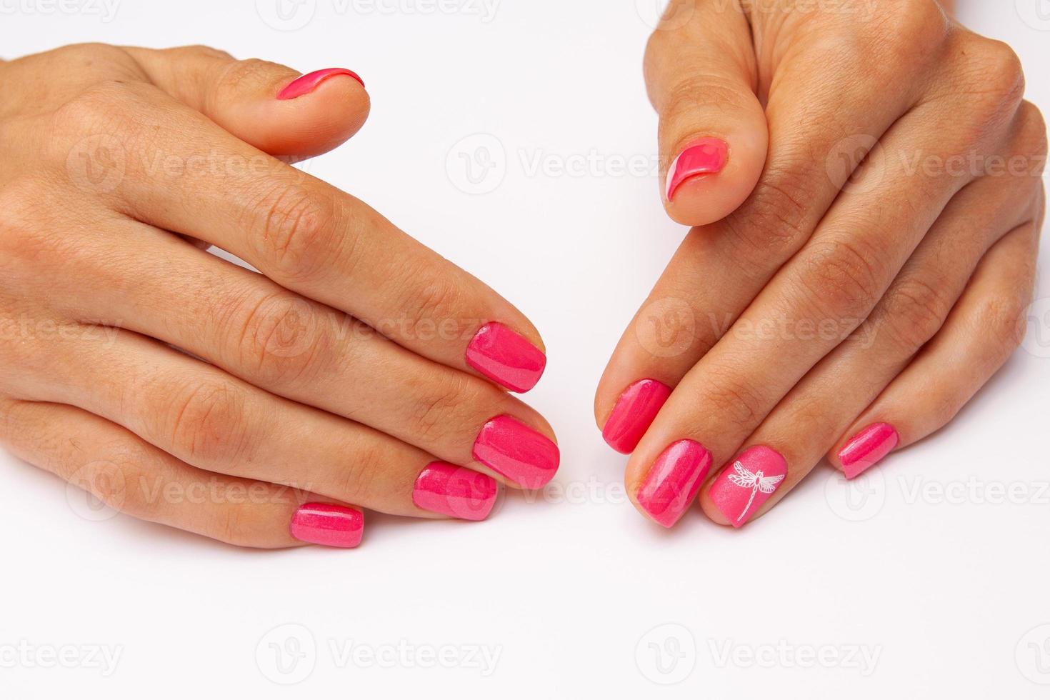 Pink gel nail polish with a combination of glossy and matte top photo