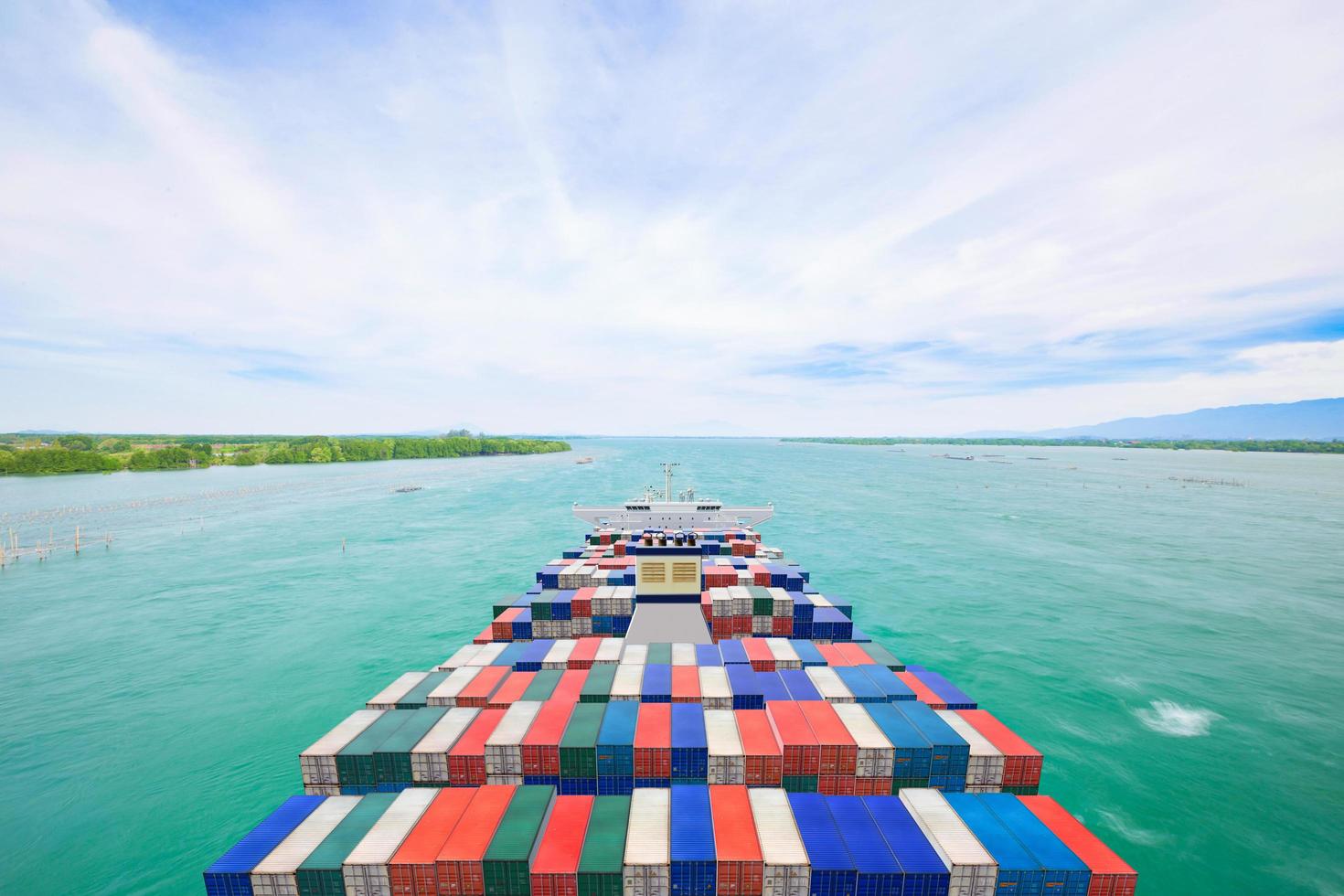 Aerial view container cargo ship and commercial plane for transport and logistic import export concept photo