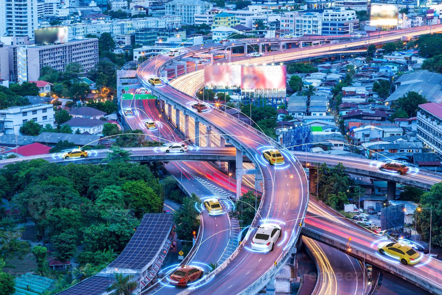 Smart cars with automatic sensor driving on metropolis with wireless connection photo