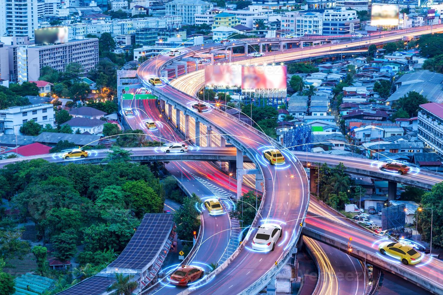 Smart cars with automatic sensor driving on metropolis with wireless connection photo