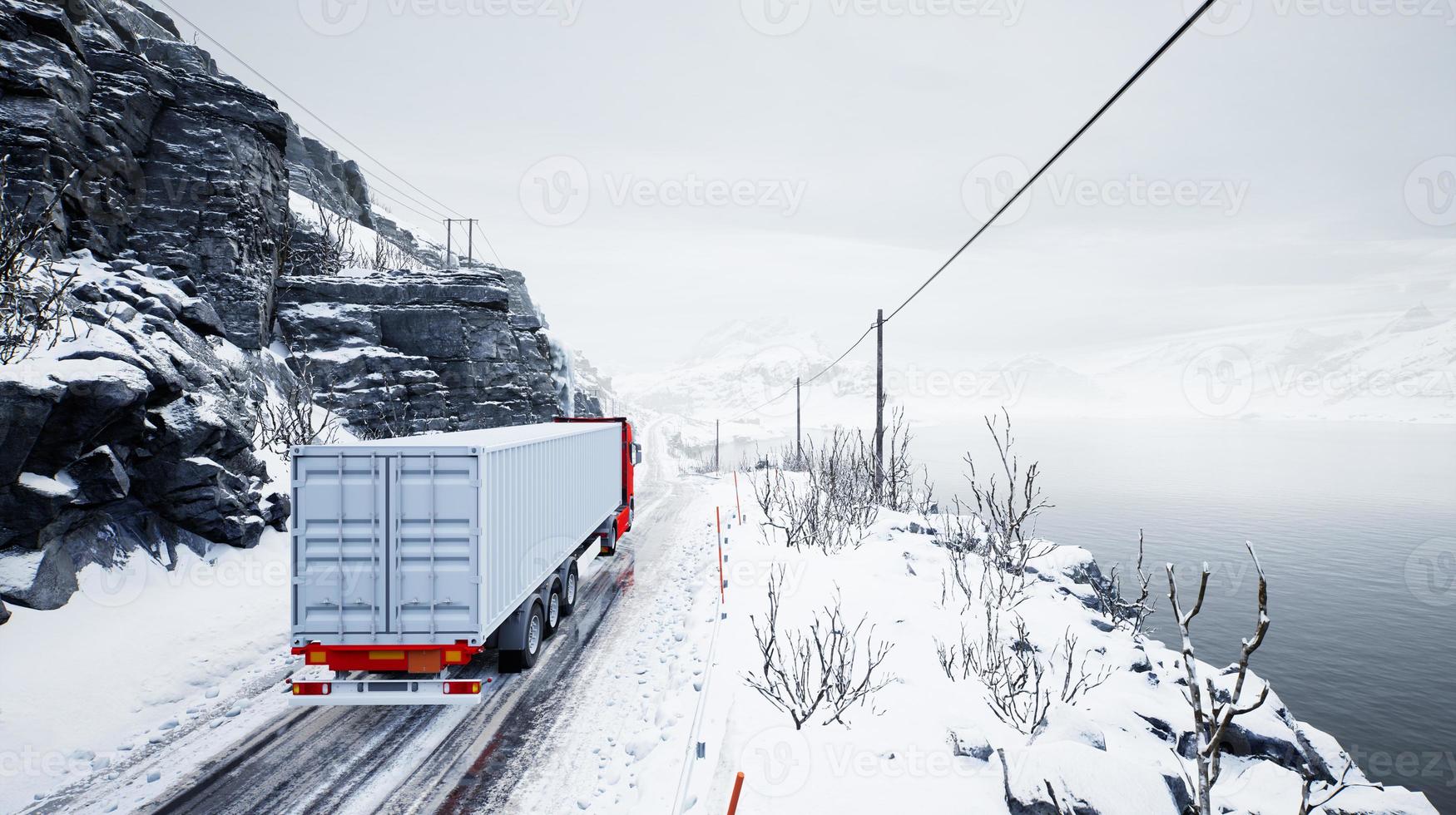 Red truck transport with container on winter road photo