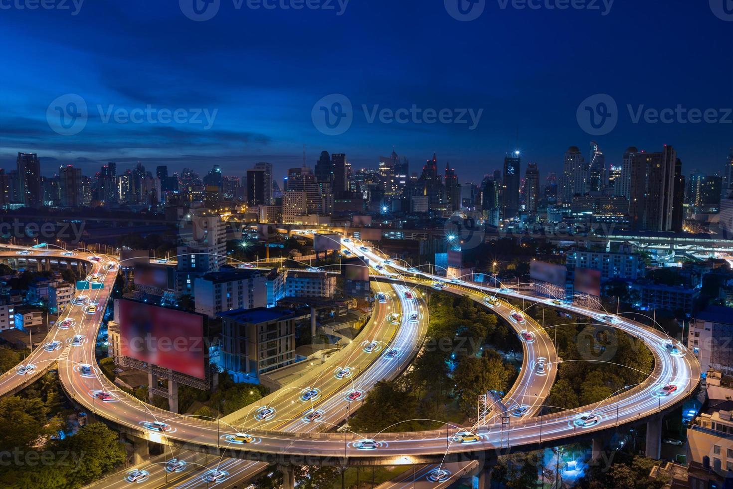 Smart cars with automatic sensor driving on metropolis with wireless connection photo