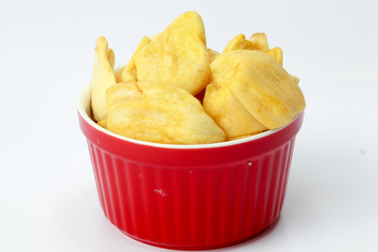 Crispy jackfruit on red bowl with white background photo