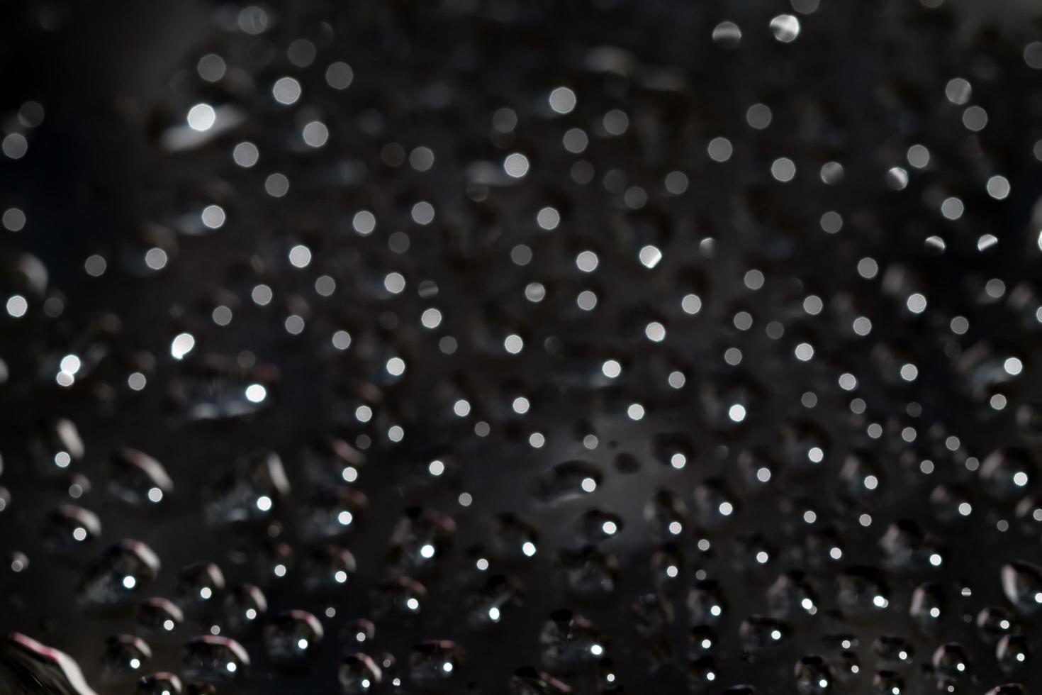 Droplet of water, bokeh on back backgroung. photo