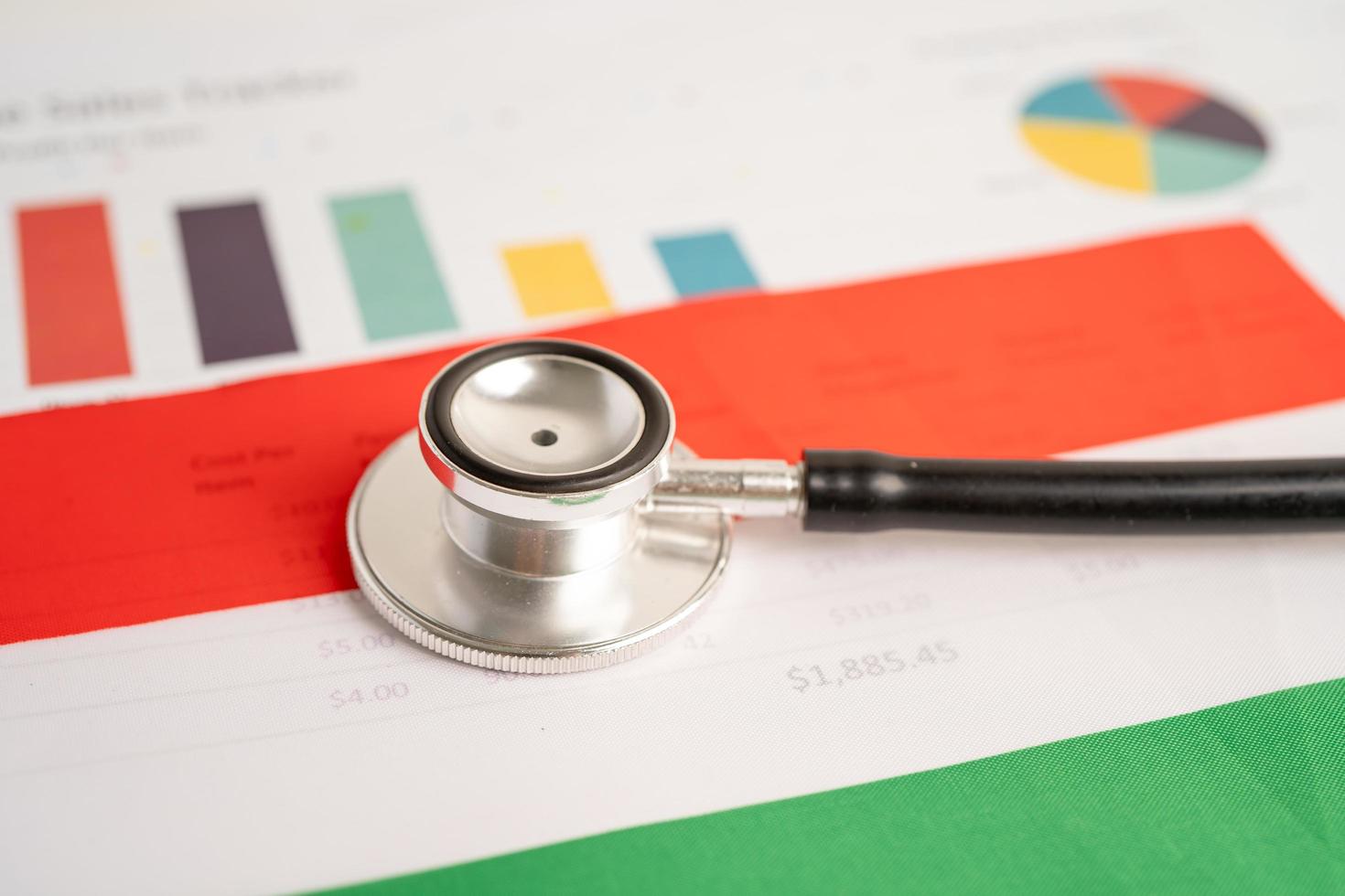Black stethoscope on Hungary flag background, Business and finance concept. photo