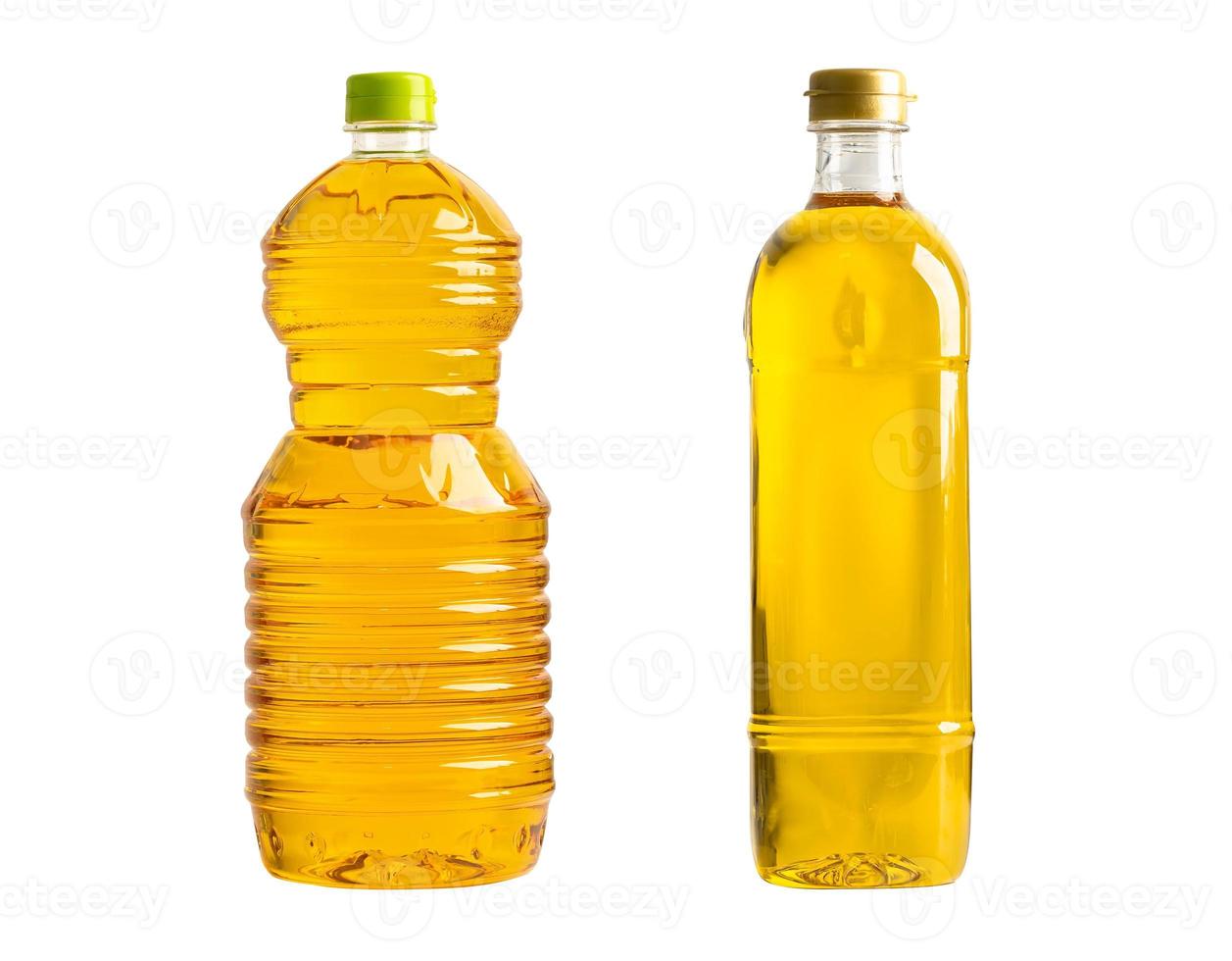 Vegetable oil with olive oil in different bottle for cooking isolated on white background. photo